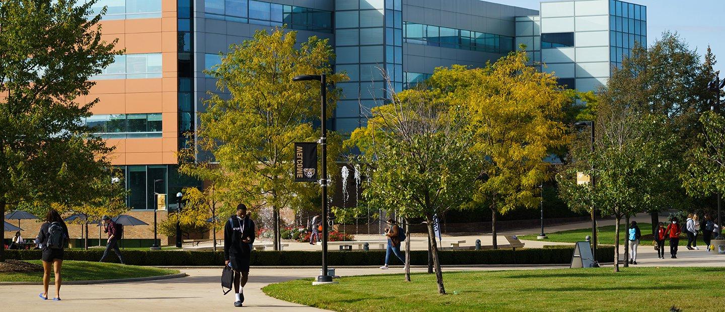 A building with blue windows on Oakland University's campus.